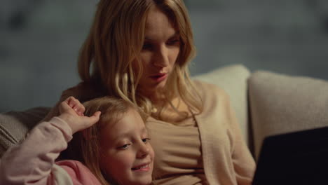 Mother-daughter-having-video-call-laptop.-Woman-girl-having-online-conversation