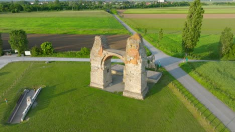 Aerial-View-Of-Heidentor---Ancient-Roman-Triumphal-Arch-in-Carnuntum,-Austria