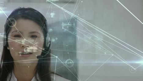 Animation-of-networks-of-connections-over-businesswoman-using-phone-headsets