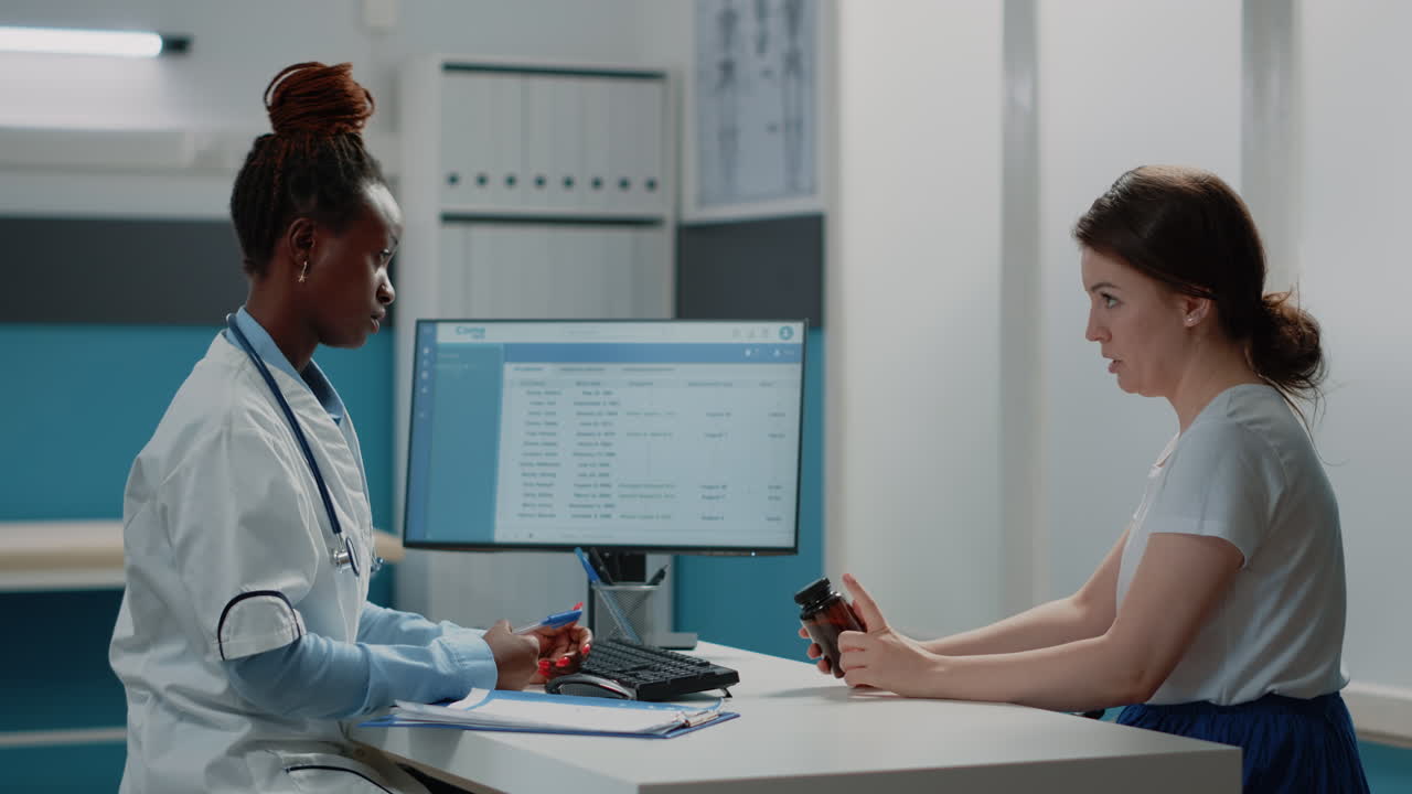 Doctor consulting with patient about medication