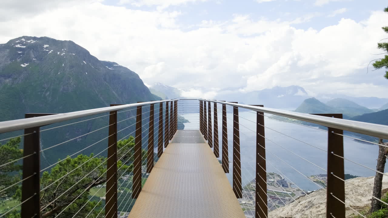 Observation Deck Of Rampestreken Overlooking The Fjord Amidst The Mountain Range In Aandalsnes, Norway