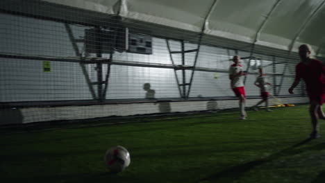 women's soccer team playing indoor