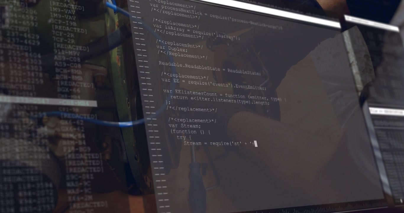 Mechanic at workbench adjusting flywheel while terminal scrolling code, guiding repair and testing