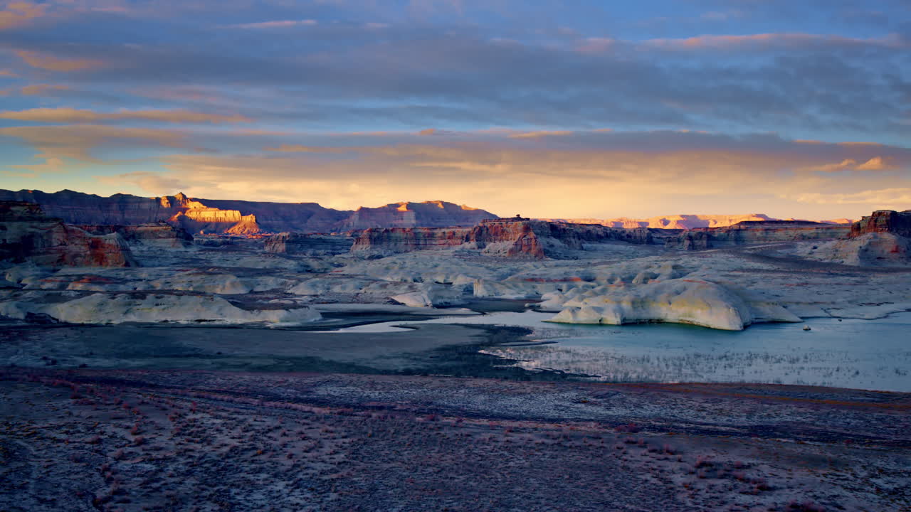 Drone glides above toadstool hoodoos, unveiling a dreamlike mix of color and stone.