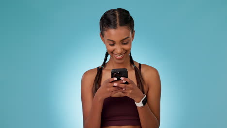 Phone,-smile-and-woman-in-a-studio-networking