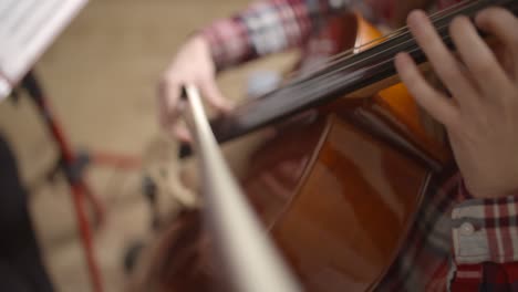 cellist playing the cello