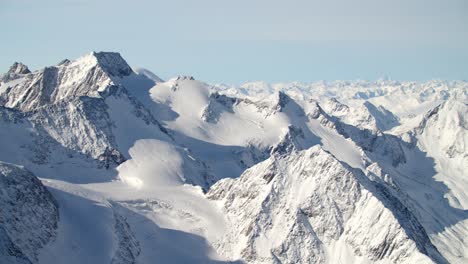 mountain panorama in the alps with fresh snow on a glacier ski resort in tirol