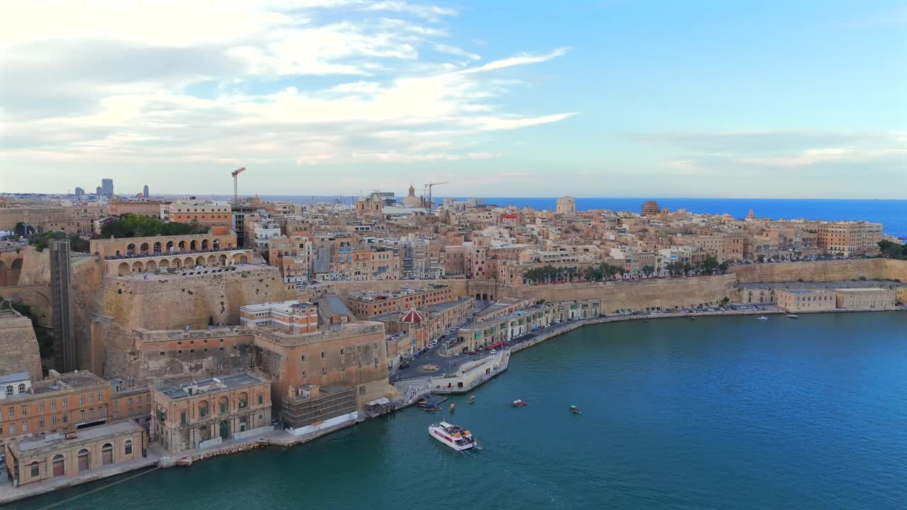 This drone footage captures the essence of Valletta, showcasing its mix of historical charm and lively coastal atmosphere.