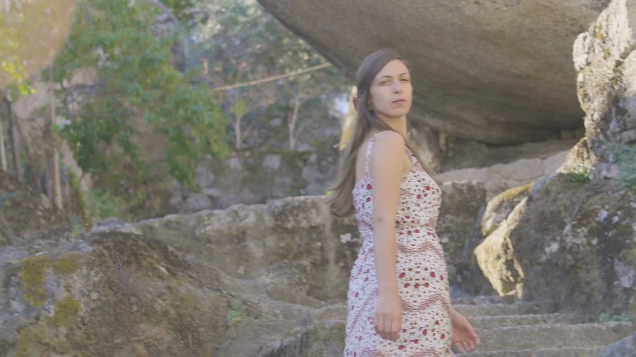 Young Woman Exploring Ancient Ruins