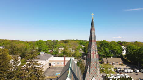 st paul's church in hingham ma, aerial upward footage revealing boston skyline in the distance