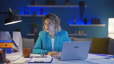 Home-office-worker-woman-looking-at-camera-with-disgust-and-hatred.