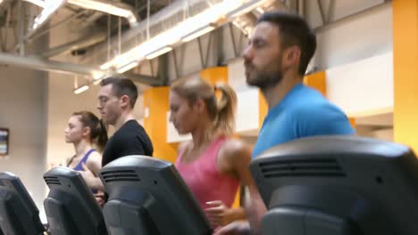 Fit-people-walking-on-treadmills