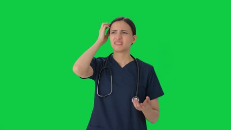 Confused-Indian-female-doctor-thinking-Green-screen