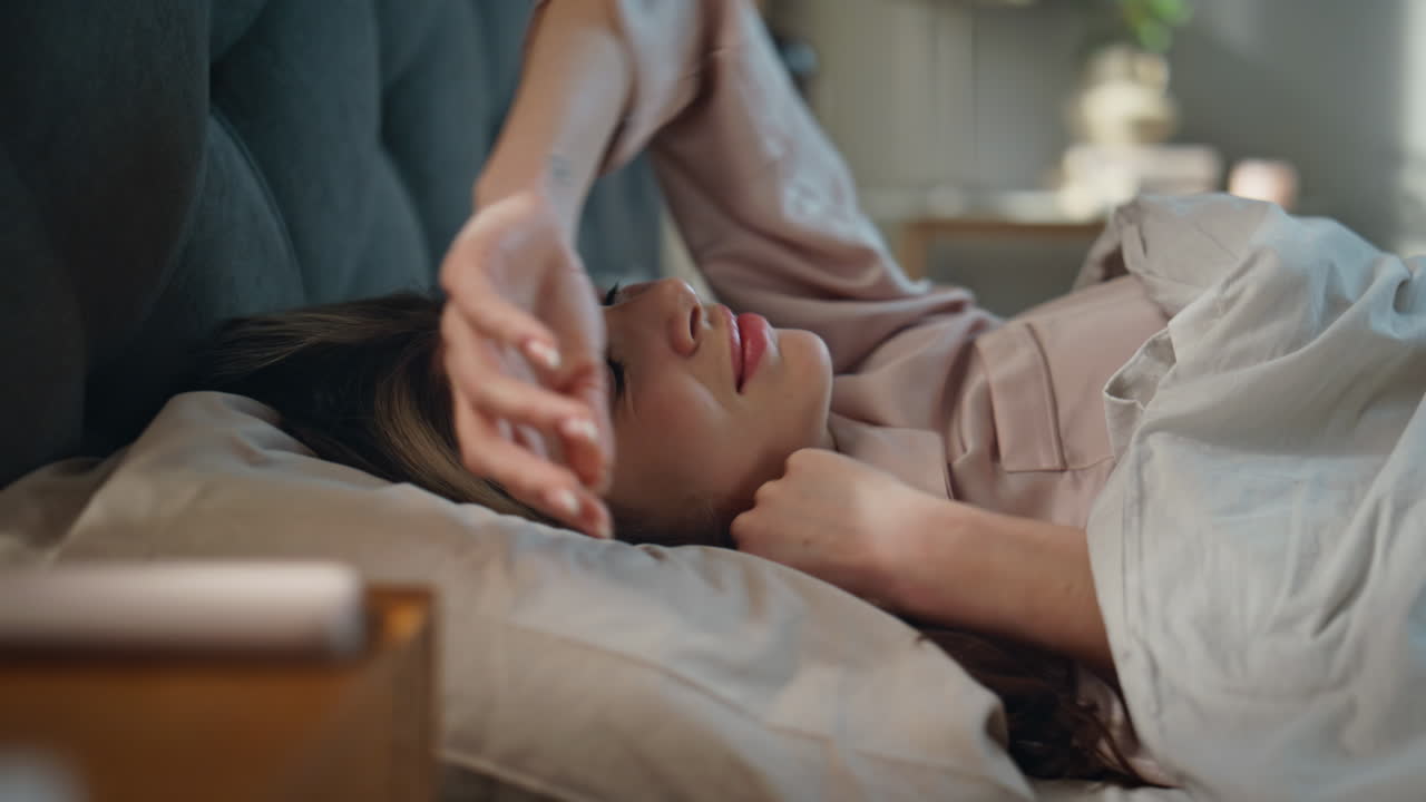 Woman in bed waking up