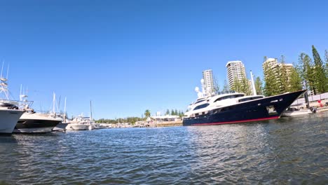 yachts docked in a sunny harbor