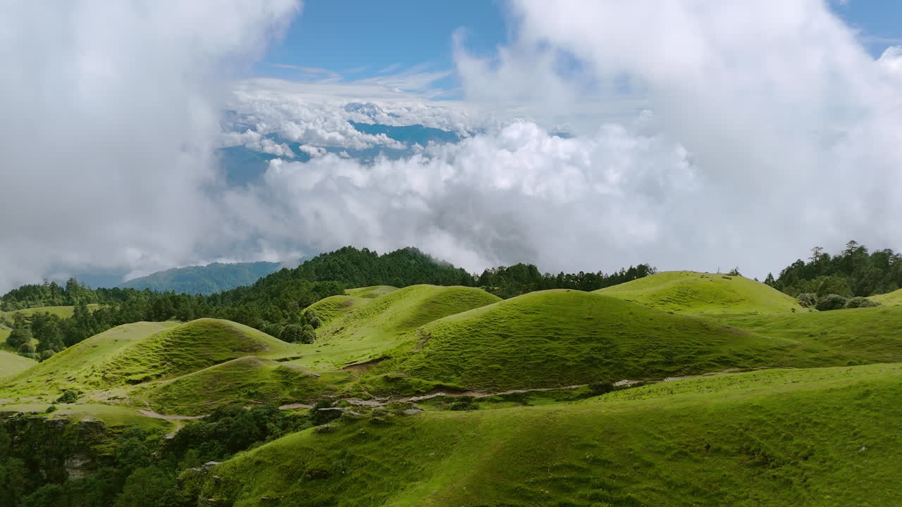 Drone shot of scenic landscape of Dolakha Shailung Nepal under clear blue sky lush greenery hills and mountains touristic place of trekking and hiking prospects for nature lovers and adventure seekers