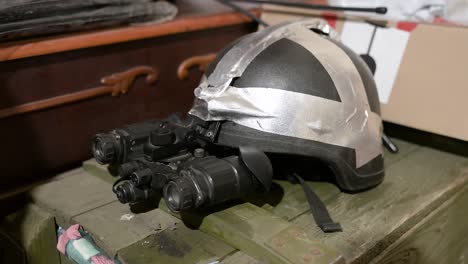 a custom-made headset equipped with night vision goggles is shown in use for military operations near the ukraine-russia war frontline.