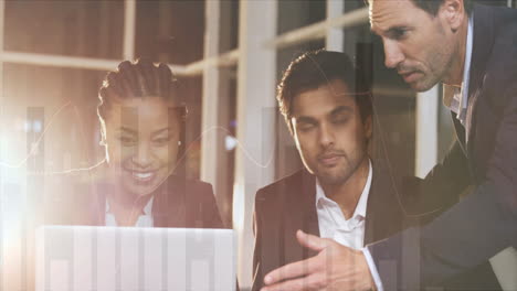 animation of financial data processing over diverse male and female colleagues using laptop