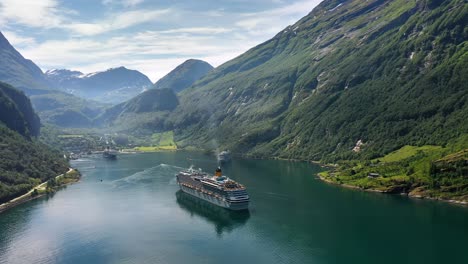 cruise liners on geiranger fjord, norway