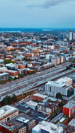 seattle american city aerial view. sunny washington state city buildings. vertical video