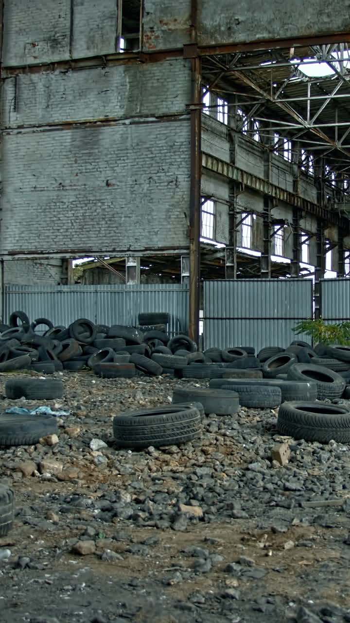 Man standing against ruin building. Young man posing against old building background