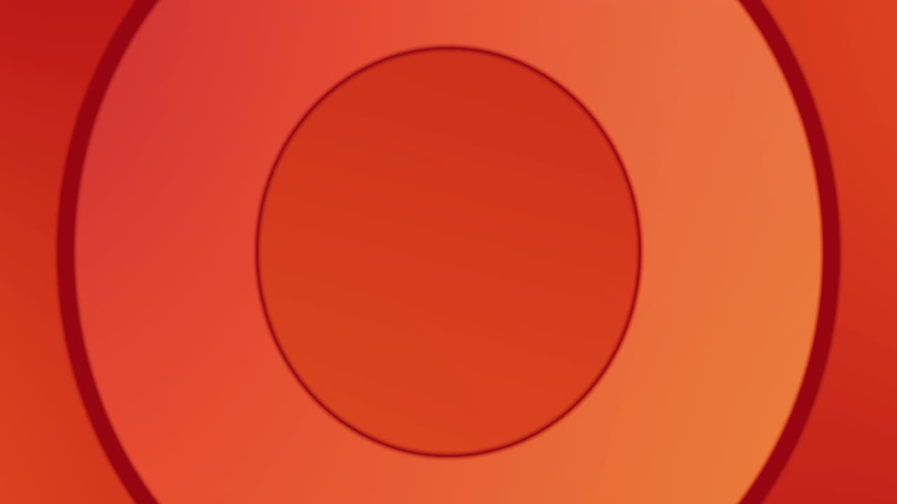 Circles forming in hypnotic motion against orange background