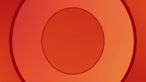 Circles forming in hypnotic motion against orange background