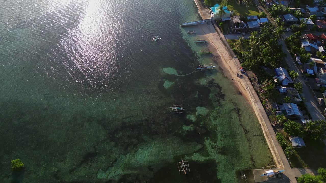 Traditional Boats Over Fishing Village In Barangay Yocti In San Andres, Catanduanes, Philippines. Aerial Drone Shot