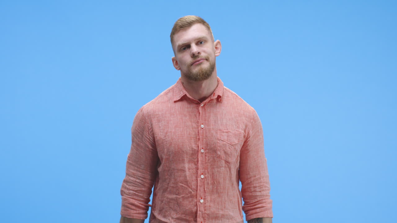bored African American Man Doomscrolling on Smartphone in Bed Shot of Bored African American Man Doomscrolling on his Smartphone while Lying in Bed