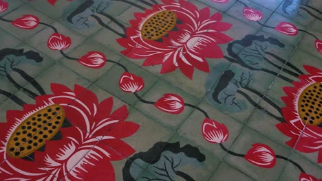 beautifully decorated floor tiles in the famous buddhist temple at penang