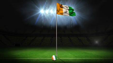 ivory coast national flag waving on flagpole