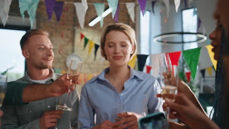 business team toasting glasses celebrating corporate victory in office close up.