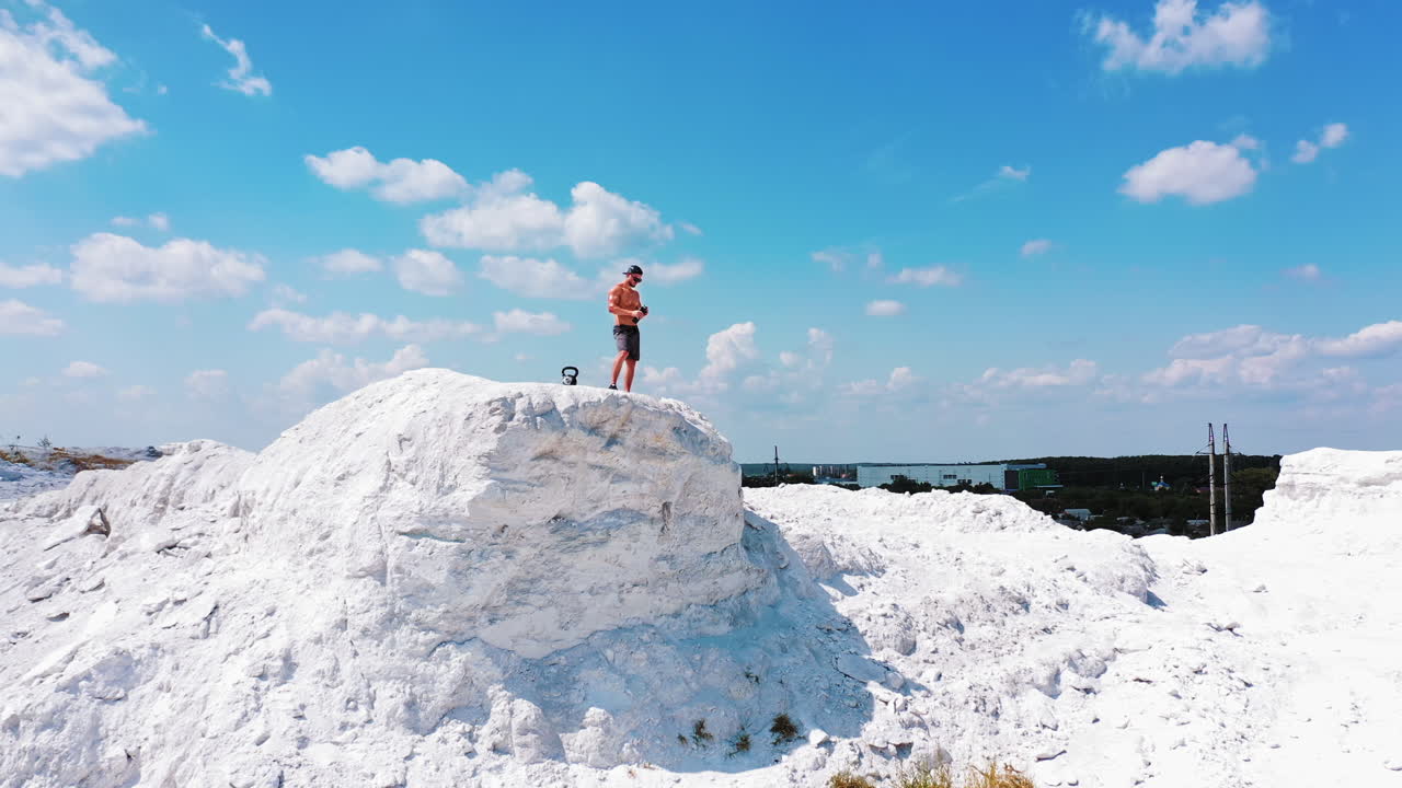 Man Working Out Outdoors on a Hill