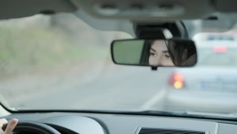 confident businesswoman driving her car, dressed in elegant business attire, showcasing independence and professionalism in a modern vehicle interior