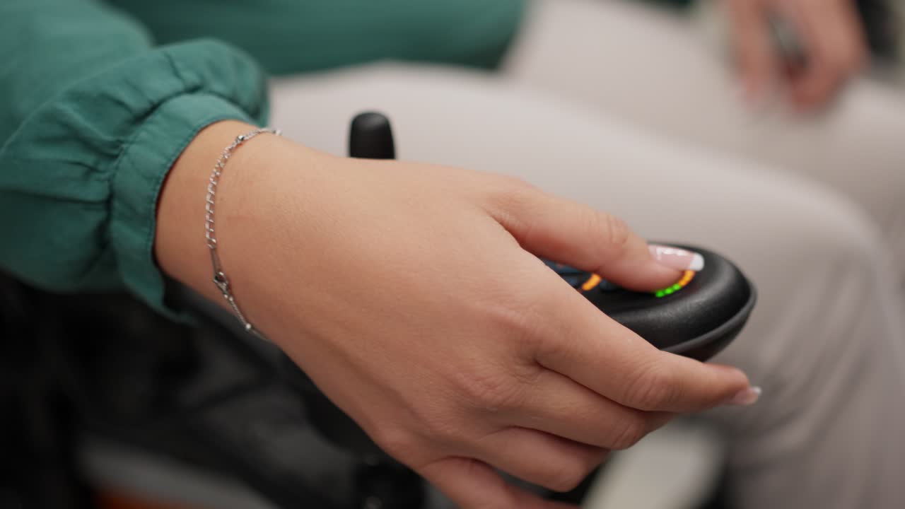 Hand controlling wheelchair joystick