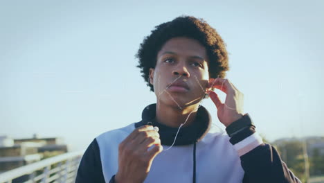 animation of thank you text over biracial runner wearing earphones