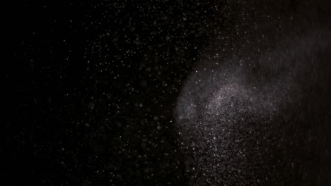 powder isolated on black background