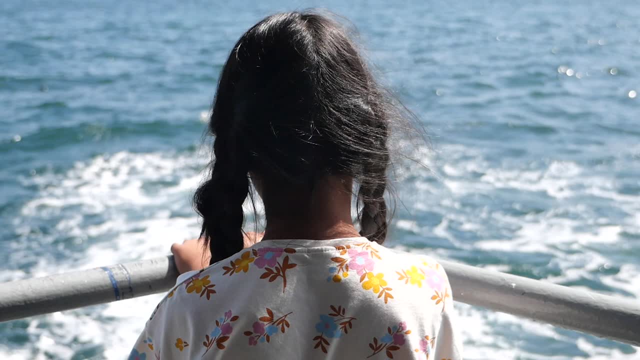 Girl enjoying ocean view on a boat
