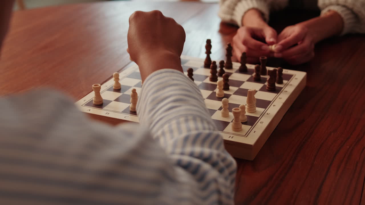 Chess Game Strategy on Wooden Board