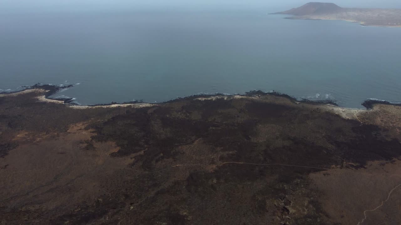 Empty Landscape Of Lanzarote Island At The Seashore Of Atlantic Ocean. aerial