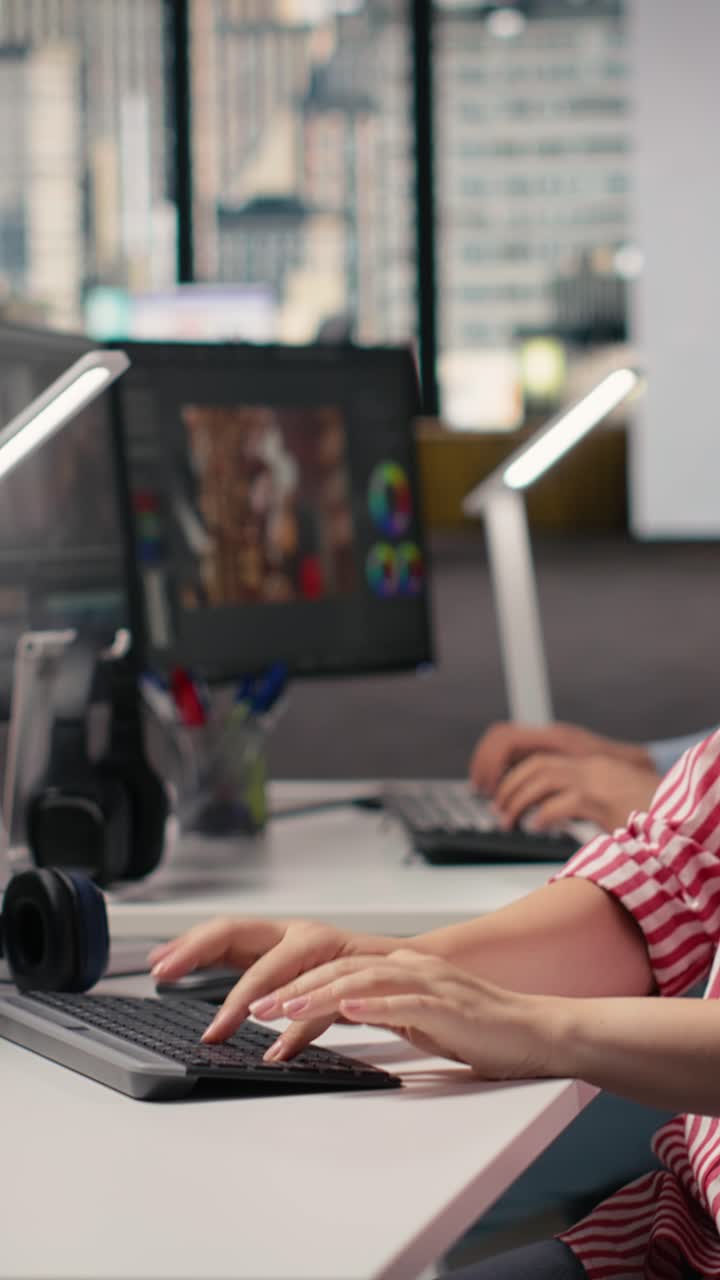 Creative Professional Working on Computer in Modern Office