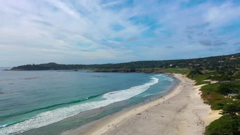 Aerial-view-revealing-the-Carmel-beach-in-sunny-Monterey,-California,-USA