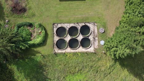 small primitive sewage treatment plant in province village, aerial