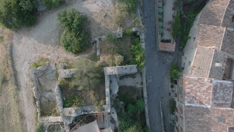 Aerial-Drone-Top-Down-Luberon-Provence-Saignon-France-Medieval-Town-at-Sunrise