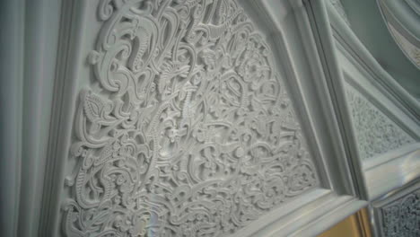 ornate white carved ceiling detail