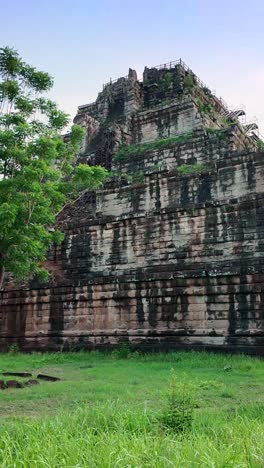 vertical ancient 10th century pyramid temple of prasat tom at koh ker, cambodia.