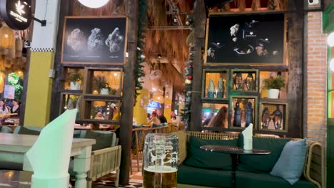 colorful outdoor bar with lively decor and ambient lighting, capturing a vibrant nightlife scene at kata beach, phuket