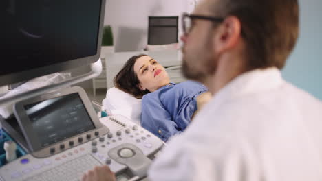 pregnant woman undergoing ultrasound examination