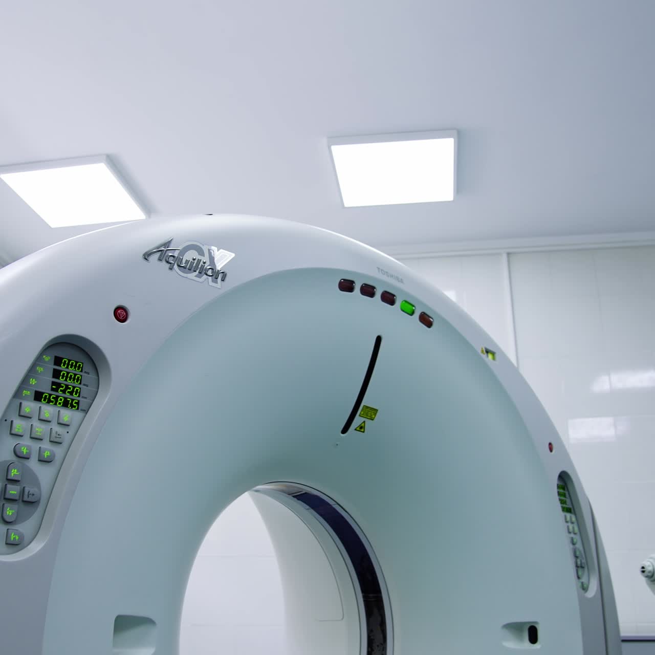 Computed tomography scanner in a hospital room. Toshiba equipment for magnetic resonance imaging. Low angle view