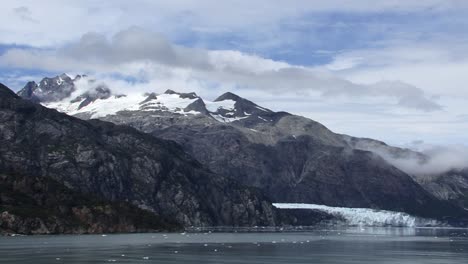 snow-capped mountain and margerie glacier view from tarr inlet in a sunny day